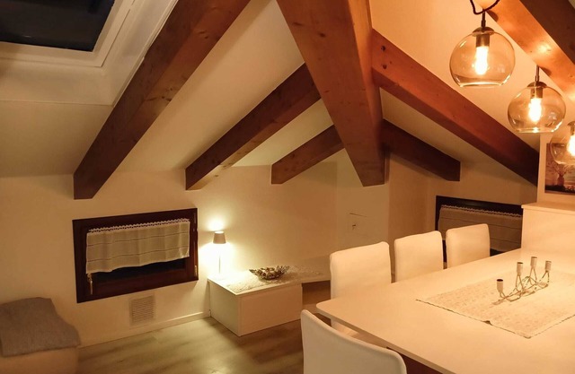 Elegant attic with Dolomites view, relaxation and nature in Levico Terme.