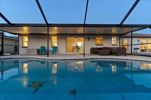 Elegant Canal Front Oasis w Pool Near Beaches