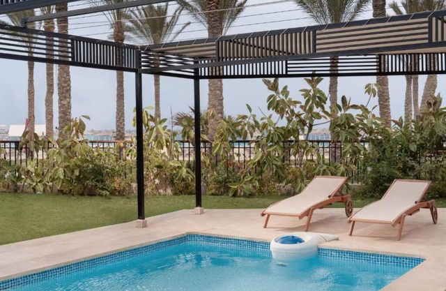 Elegant Oasis Steps From Almaza Bay Beach with Private Pool Access and Breakfast