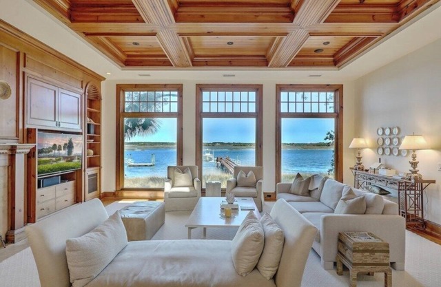 Elegant Riverfront Retreat with Dock, Gourmet Kitchen, and Panoramic Views