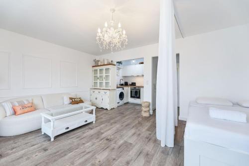 Elegant Studio Getaway with Balcony & Charm