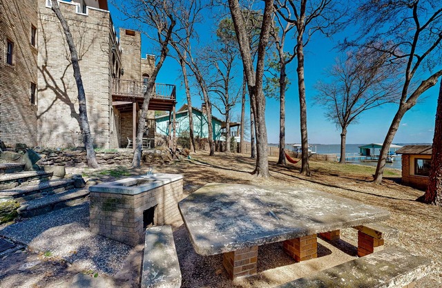 Elegant & unique abode with canoe, kayaks, dock, grill, wood fireplace, W/D, AC