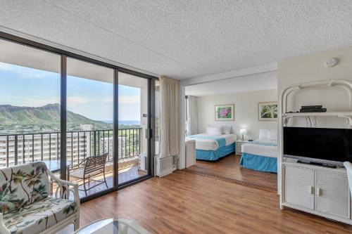 Elevated Condo with Diamond Head & Ocean Views, Steps from Waikiki Beach (13011)