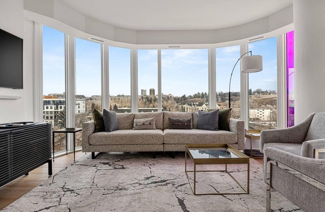 Elite Urban Living: 3BR w/ DT Views, AC & Parking