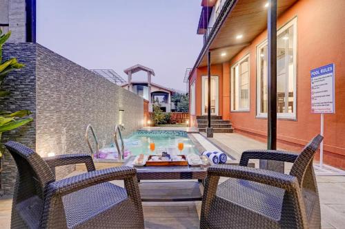 ELIVAAS Irene Jade 3 BHK with Pvt Pool & Balconies