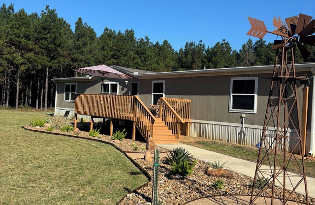 Enchanting and relaxing 4-bedroom pine house with plenty outdoor space to enjoy.