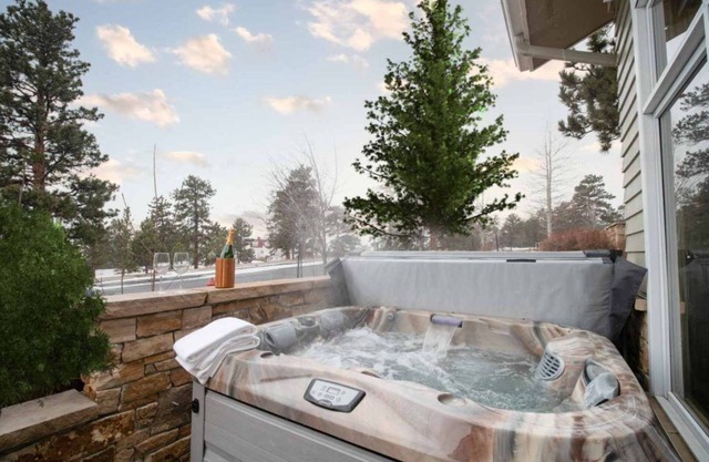 Enchanting condo with fireplace, patio, and private hot tub!