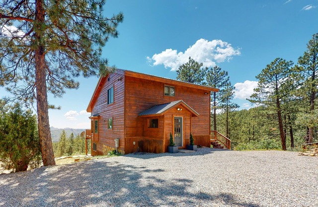 Enchanting mountainside home with fireplace, skiing, lake view, & washer/dryer