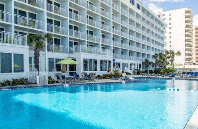 Enjoy Daytona Beach in this 1BD resort condo with resort amenities