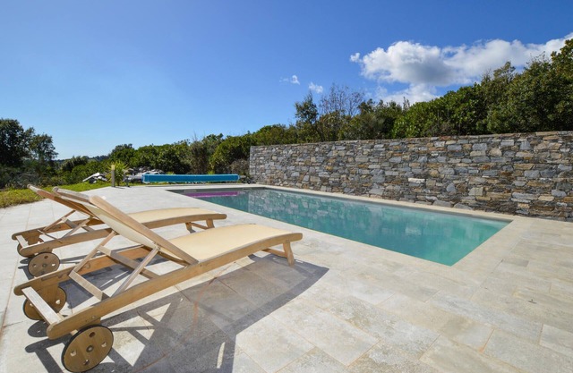 Enjoy the fantastic views from this modern Corsica vacation home.