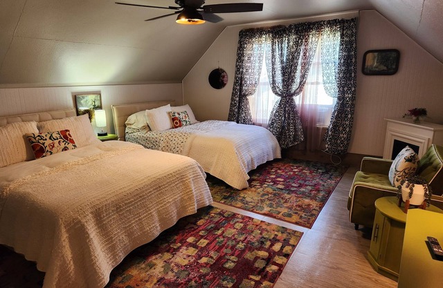 Enjoy the top floor of this victorian house With two suites & a bonus bedroom
