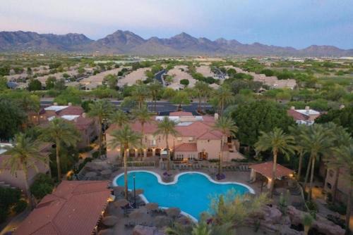 Enjoy two outdoor pools in this resort setting 1BD resort condo