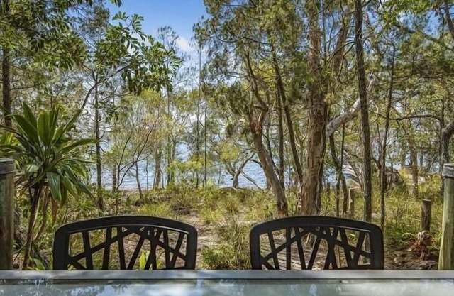 Enjoy your stay at this beautiful three level lake front home.