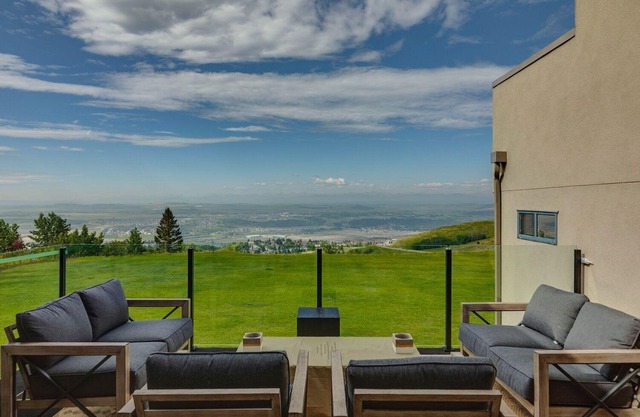Entertaining custom home with 180 degree views of the Rocky Mountains