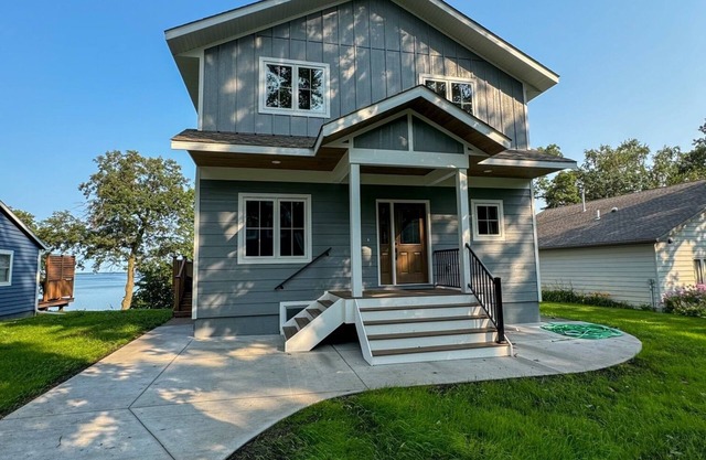 Escape to a lakeside cabin with stunning panoramic views of Ottertail Lake