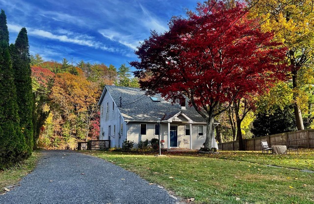 Escape to a stunning two-story home nestled on serene Esopus Creek in Saugerties