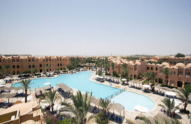 Escape to Comfortable Room with Balcony and Pool for Fun Seaside Memories