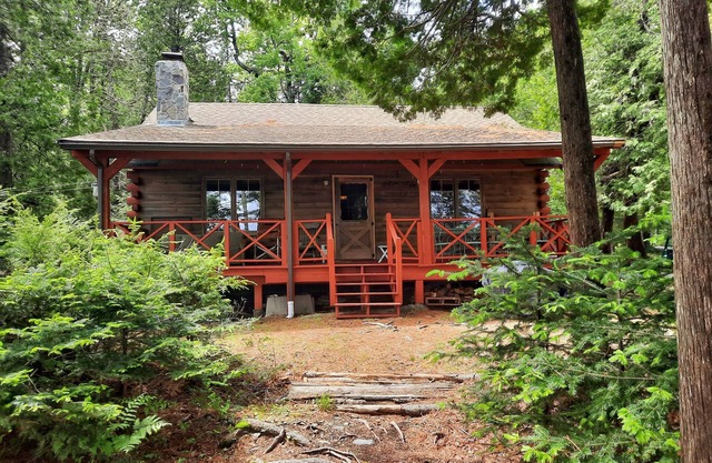 Escape to Howie's Camp: Unwind and Recharge at This Lakefront Log Cabin