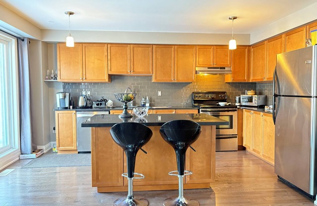 Escape to our cozy master ensuite, East Pickering, in charming home. Wifi and AC