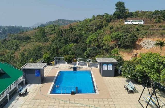 Escape To Serenity, Vagamon's Hidden Gem: Luxurious Poolside Haven.