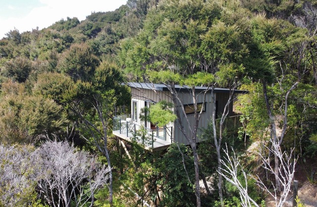 Escape to this romantic cabin in amongst the trees.