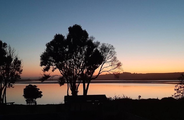 Estuary Essence - Sleeps 13 and has beautiful sunsets!