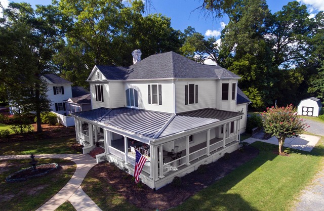 Exceptional 1907 Victorian home with 6 bedrooms in downtown Fort Mill