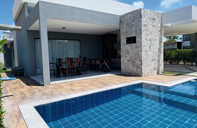 Exclusive paradise, House in a beachfront condominium.
