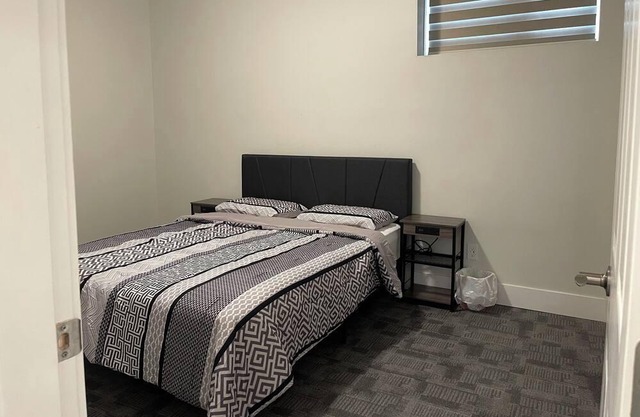 Executive 1BR+Den Walk-Out Suite Backing Park