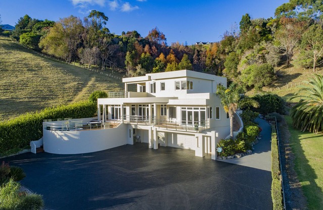 Executive Home in Exclusive Gated Community. Private Beach, Private Walkways.