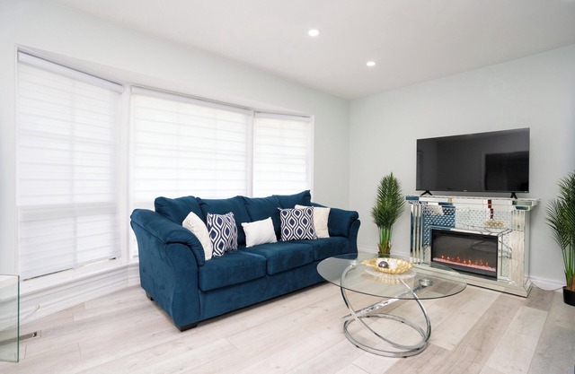 Executive Modern Home with Backyard Oasis close to the Airport
