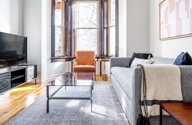 Expansive Lincoln Park 2BR, walk to L + Clark Street dining, by Blueground