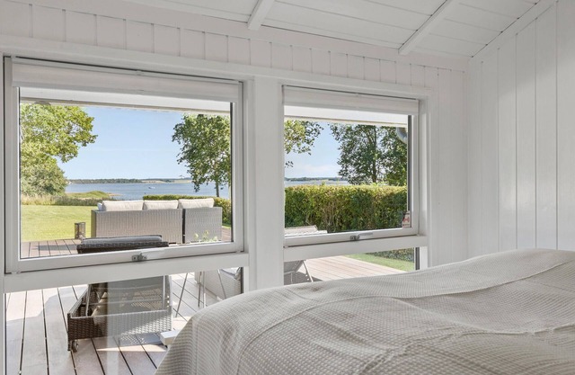 Experience a wonderful break in this holiday home with fjord views.