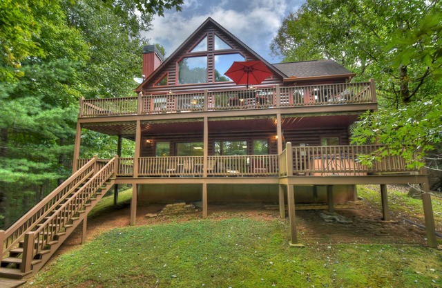Experience Lakeview Retreat, where pets are pampered by the shimmering waters. Unwind in a hot tub, enjoy WiFi, and a full game room w/ pool table