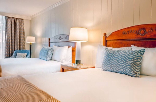 Experience Modern Comfort: Room w/ Cozy Beds & Pool Access