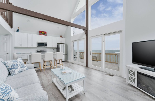 Experience the serene beauty of the Soundfront at Shenanigan's, a charming home in Kill Devil Hills
