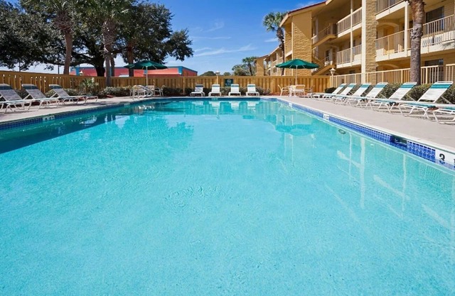 Experience Value & Comfort Minutes from Orlando International Airport! | w/ Pool