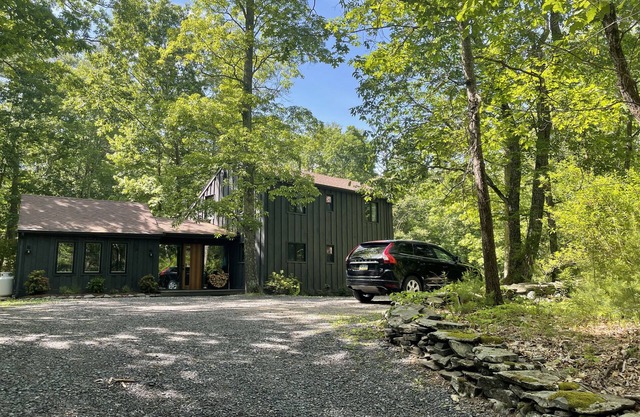 Experience Woodstock charm while staying in a cozy cabin in the woods