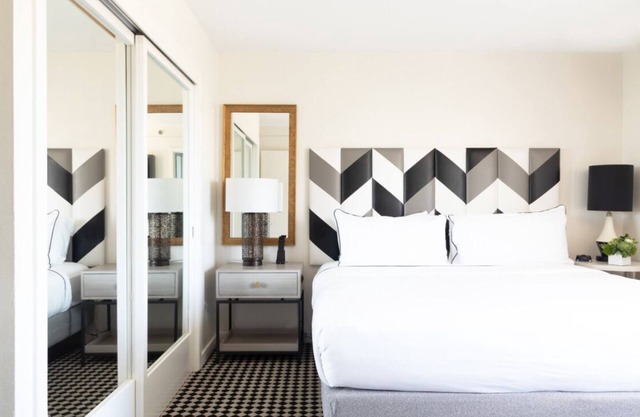 Explore Luxurious Suite with Living Spaces, Private Balconies, Rooftop Pool!