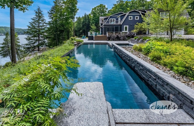 Exquisite 8 bed, 7 bath cottage on Lake Joseph boasting infinity pool + hot tub!