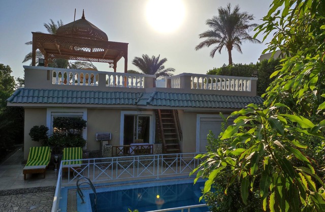 Extremely private Villa with pool and garden, access to private beach.