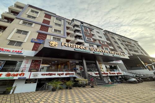 FabHotel Rising Surya - Nr Embassy Tech Zone