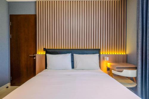 Fabulous 1BR Apartment at The Newton Ciputra World 2 By Travelio