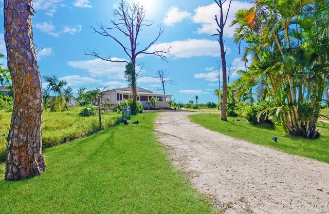 Beautiful Country house overlooking 13.5 acres and a small lake