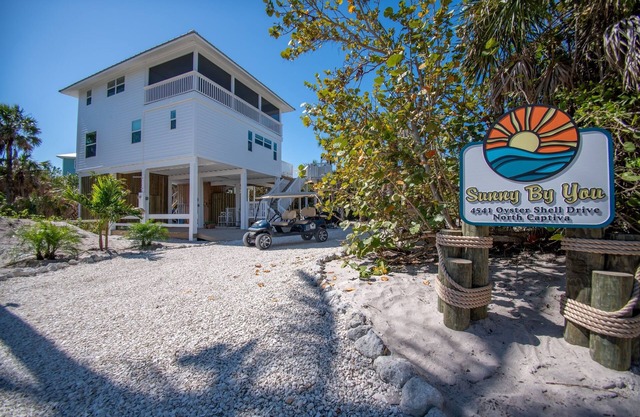 Fall Special! Beautiful Island Home, Private Pool, Steps from Beach, Golf Cart