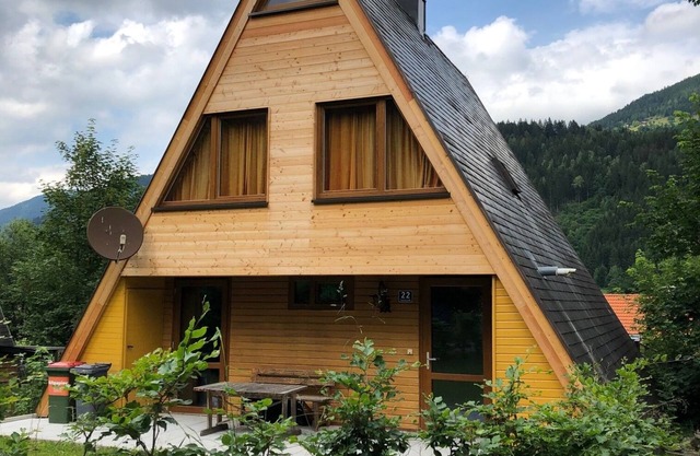 Acogedora casa en forma de A con chimenea cerca del lago en el área de Nock de Carintia