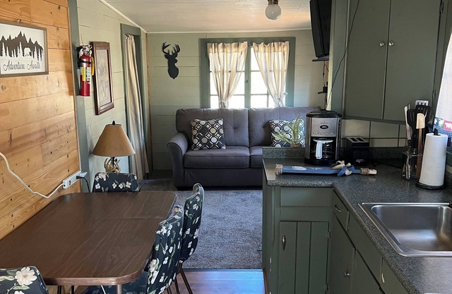 Family friendly cabin close to playground. Amazing swimming beach