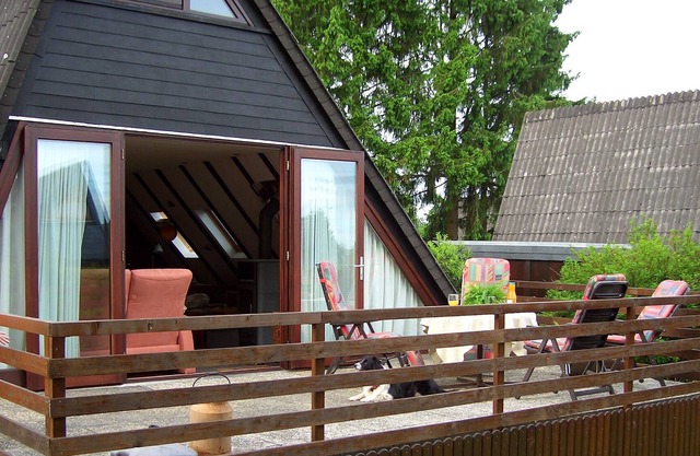 Casa para familias con chimenea y zona boscosa