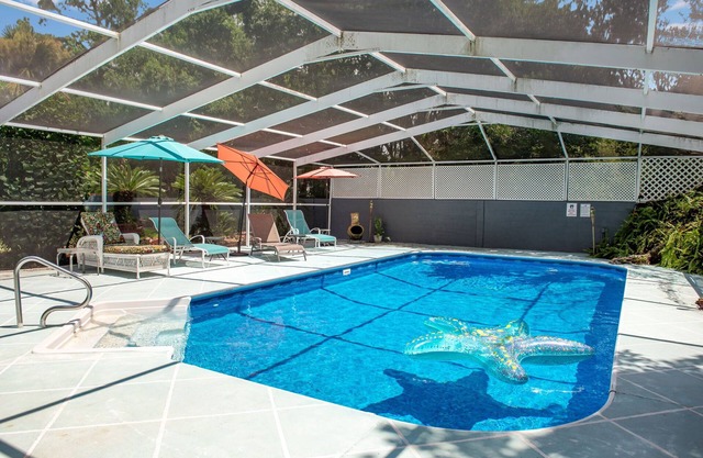 Family-friendly home with heated salt pool min from the beach