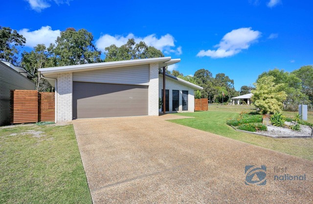 Family home overlooking park land